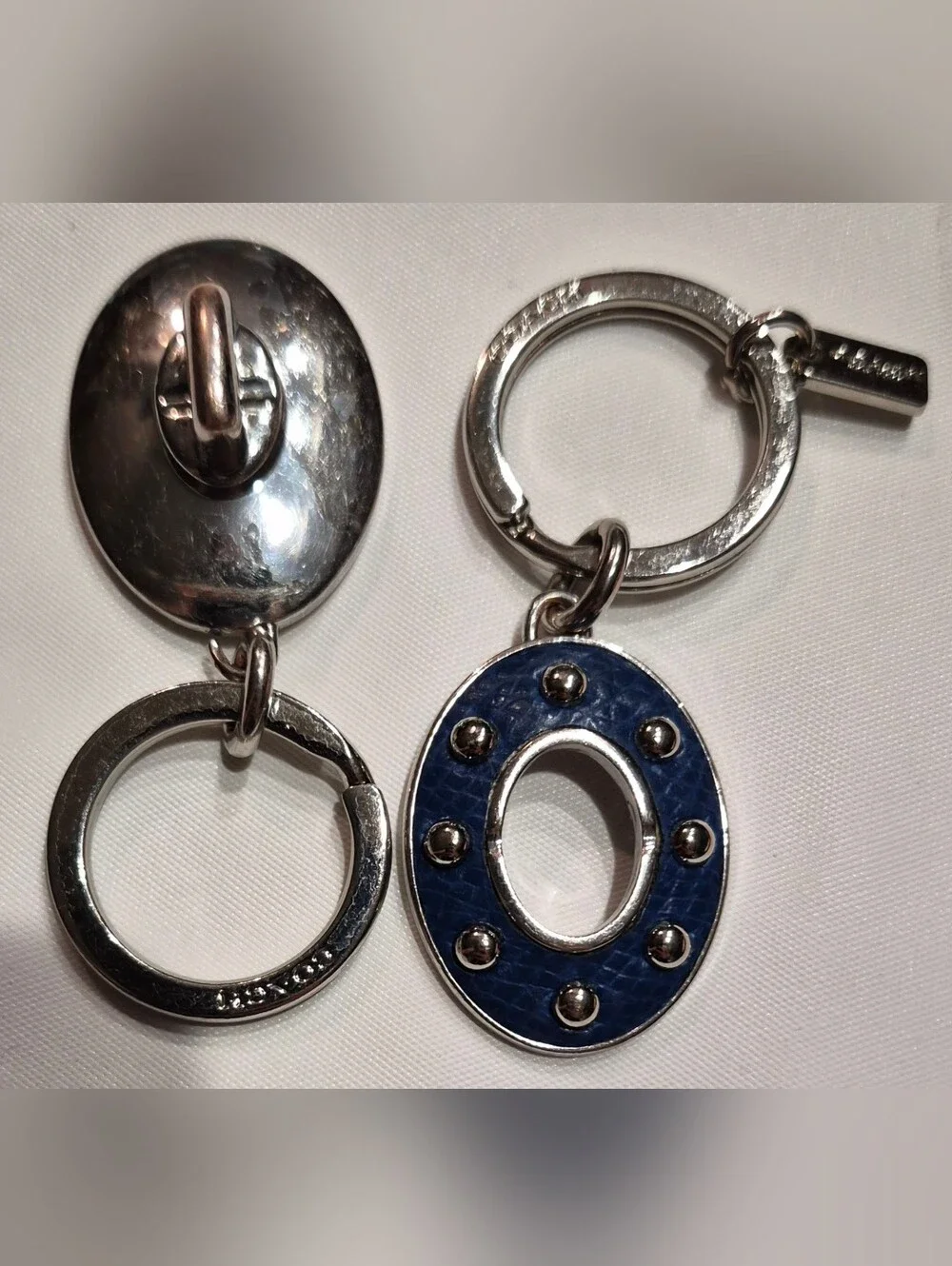 Coach Studded Leather Turnlock Keychain